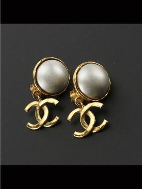Vintage CHANEL 1990's  Gold Plated CC dangle drop statement clip-on earrings.
